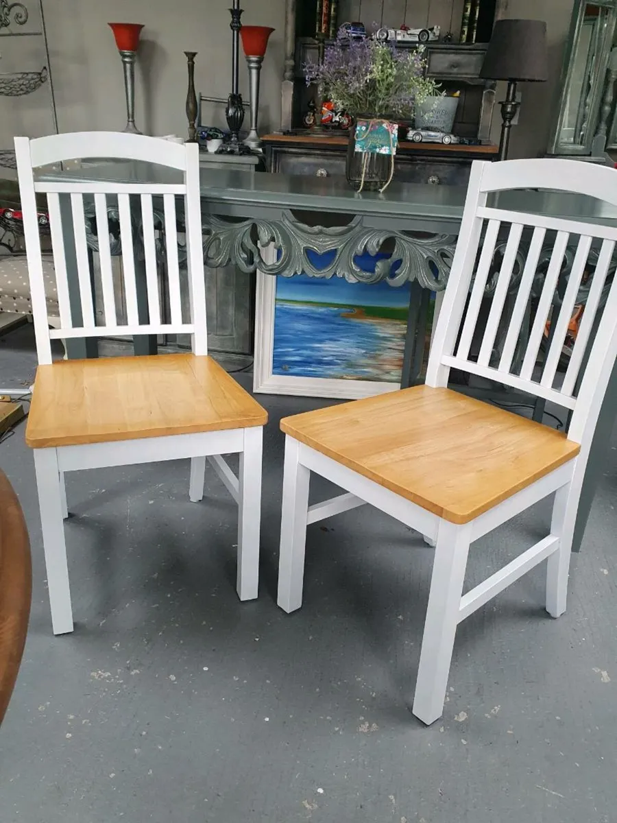 2 solid wood dining chairs - Image 1