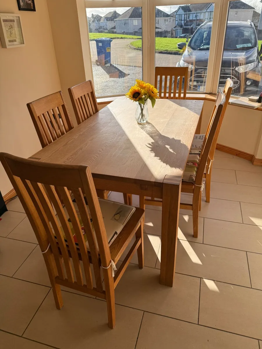 Solid wood table and six chairs - Image 1