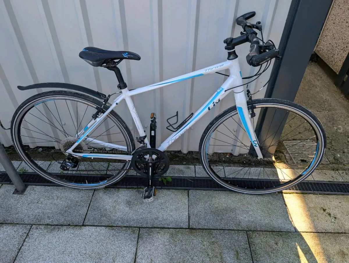 Ladies giant thrive road bike medium frame - Image 1