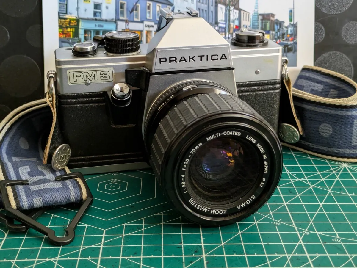 🎞️ Praktica SLR camera+Sigma Zoom-Master lens - Image 1