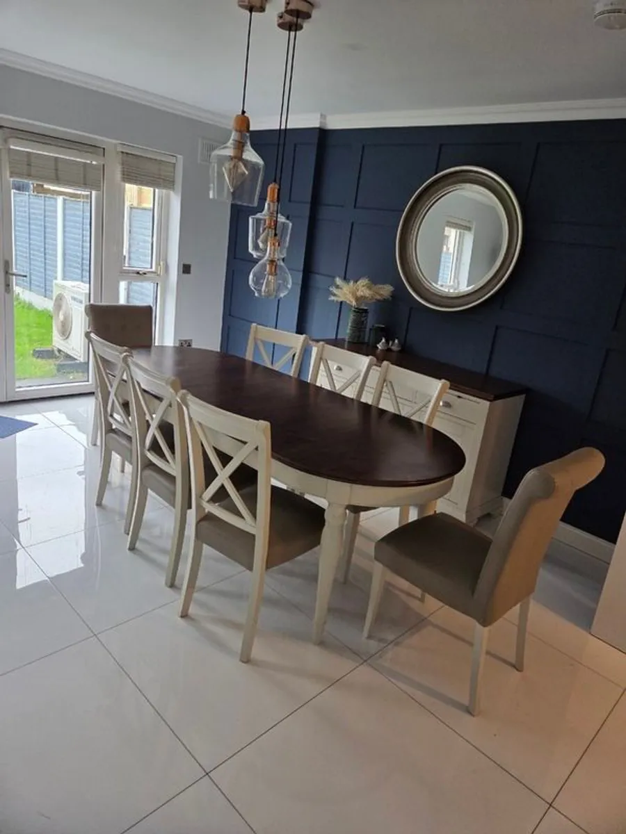 Dinning table, chairs and side board.