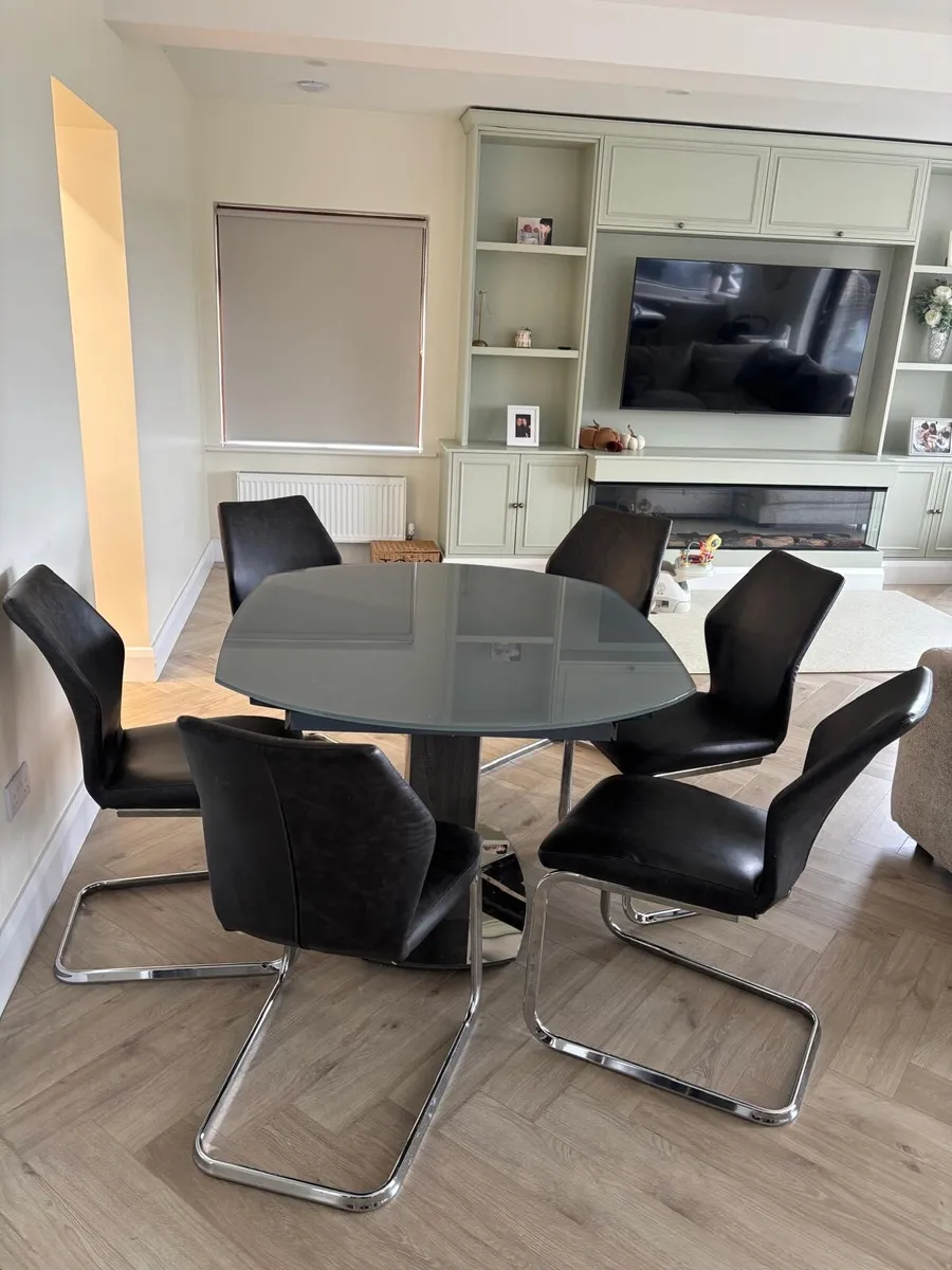 Grey Glass extendable table with 6 chairs - Image 1