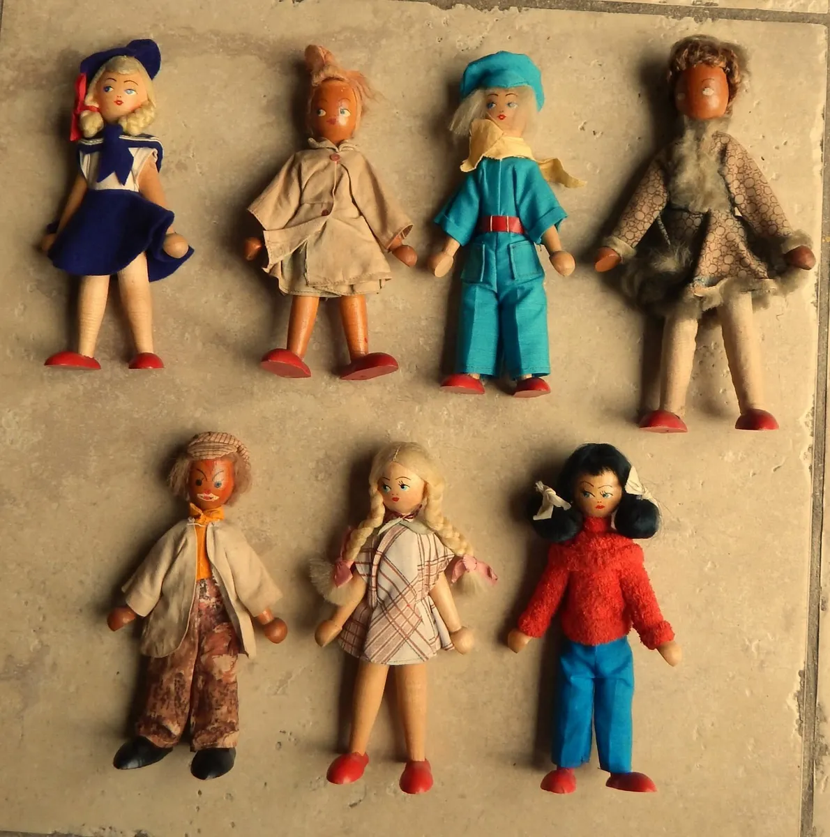 Collection of 7 Vintage Handmade Wooden Peg Dolls - Image 1