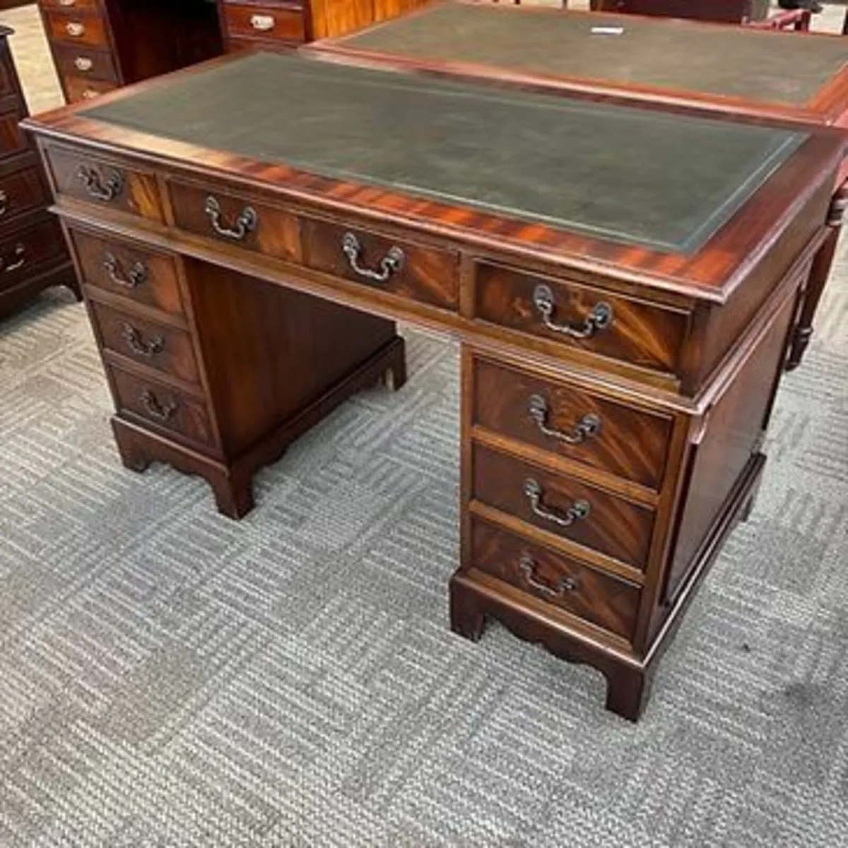 Mahogany flamed green leather top twin pedestal wr