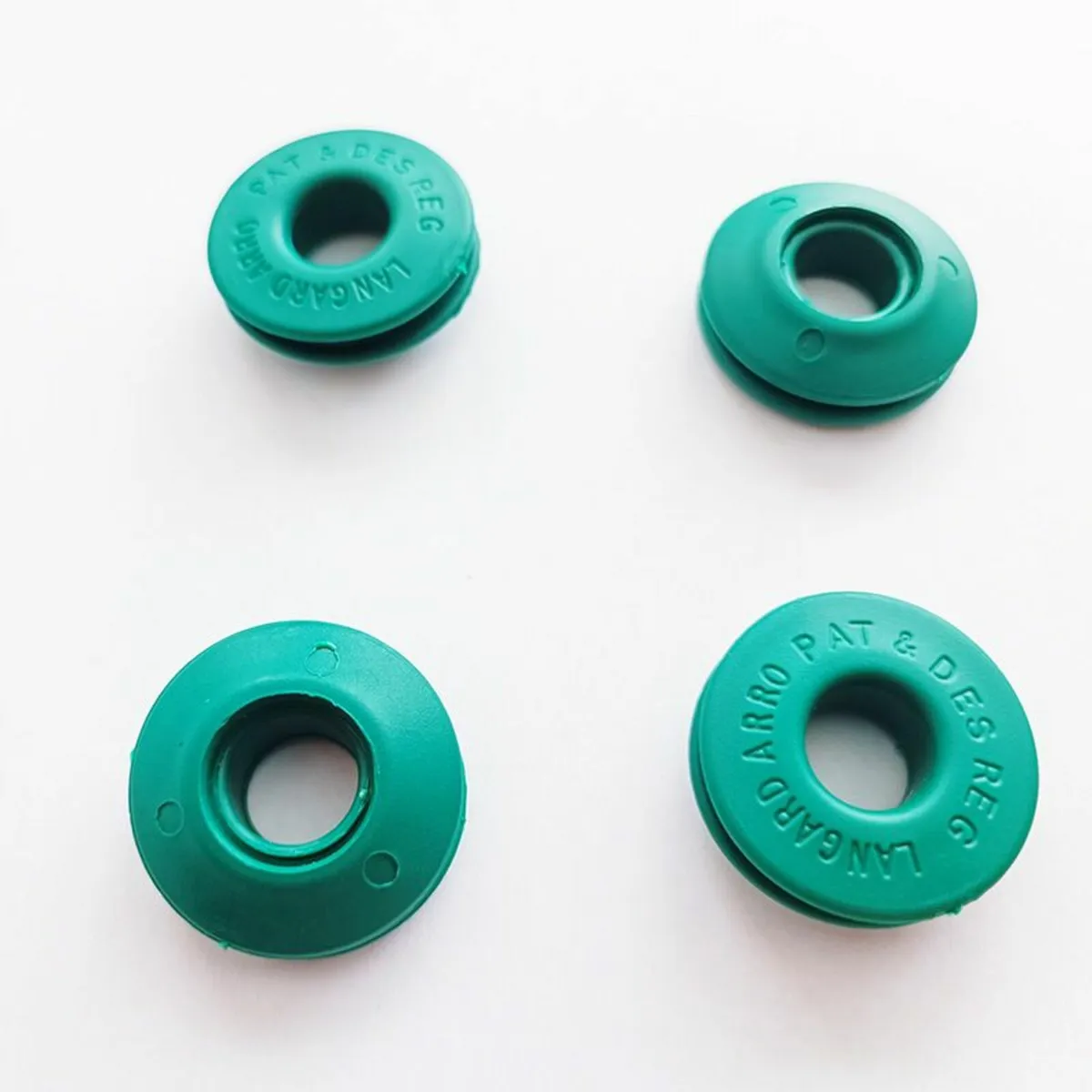 Green plastic eyelets  12mm - 10 pk - Image 1