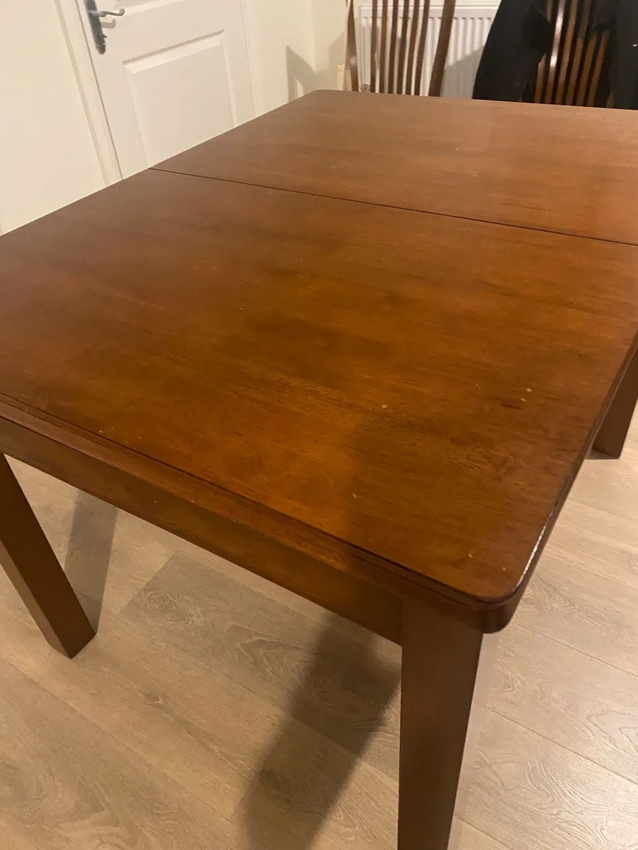 Extending oak dining table - Image 4