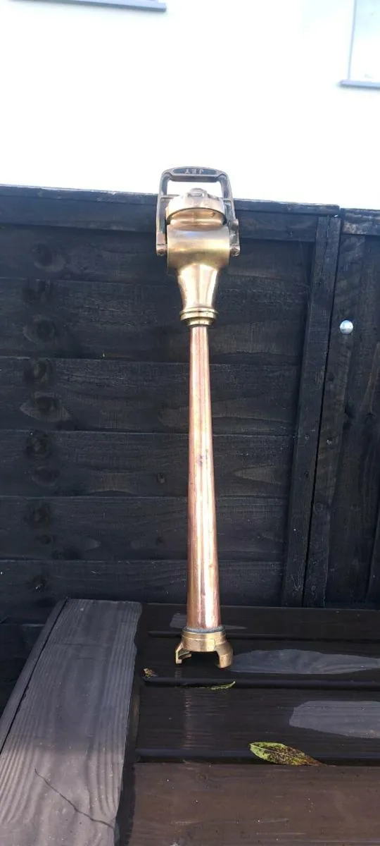Old fire mans bronze copper hose - Image 1