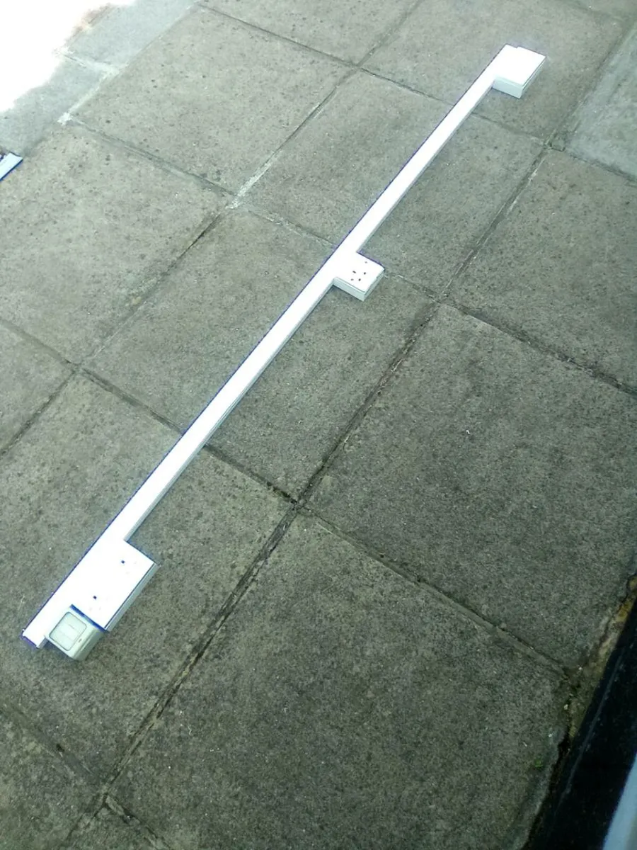 3. SOCKETS.  AND. SWITCH. ON. PLASTIC   TRUNKING - Image 1