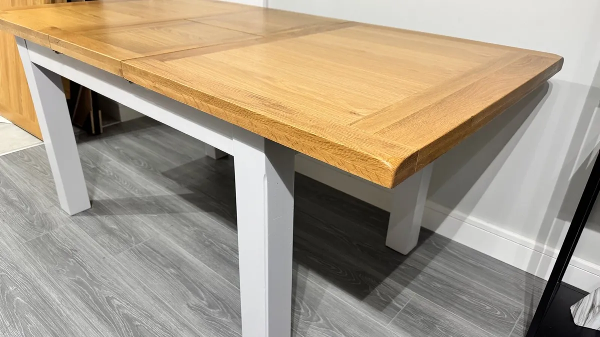 Extending Solid Oak Dining Table Like New - Image 1
