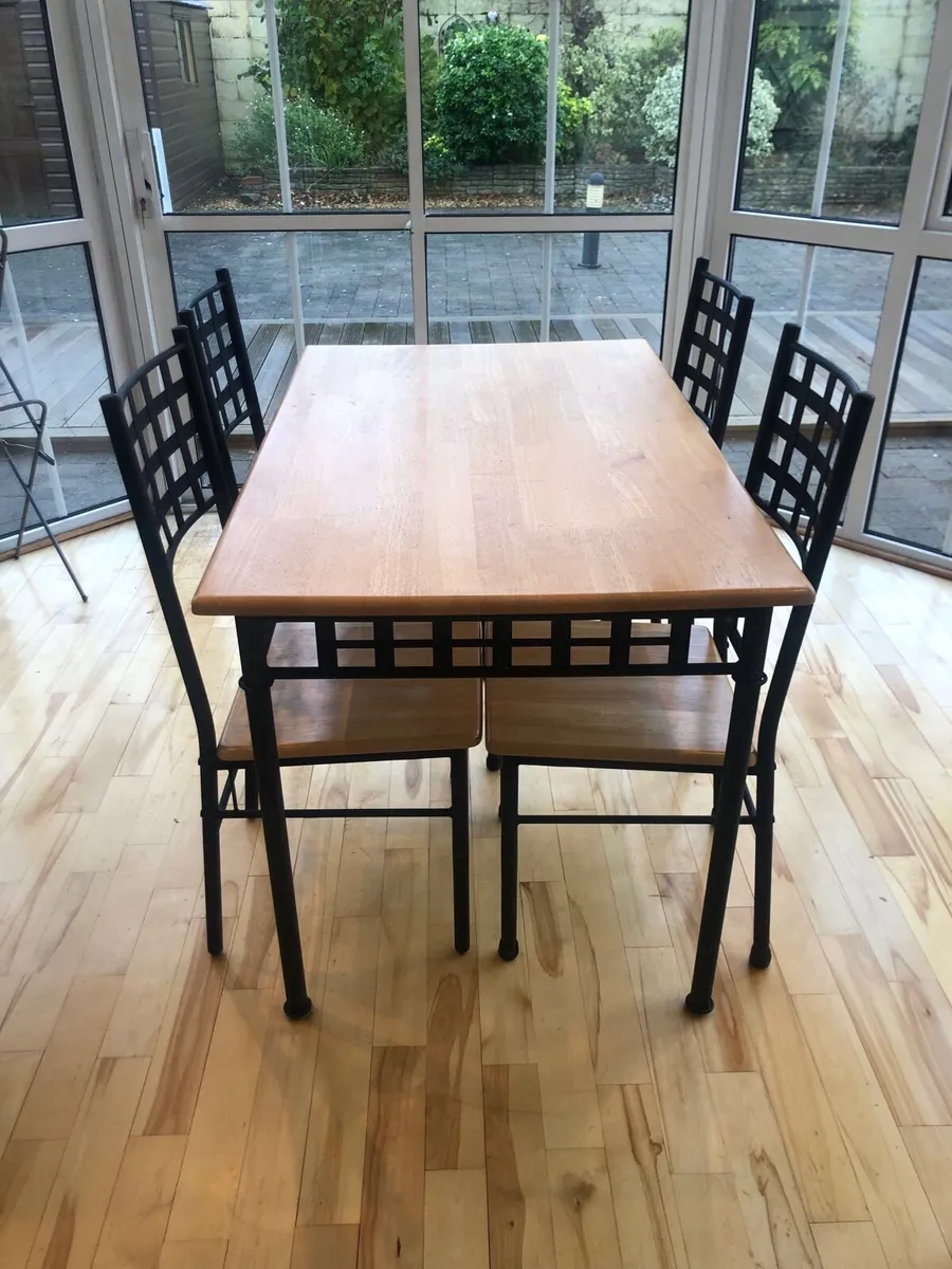 Table and four chairs - Image 1