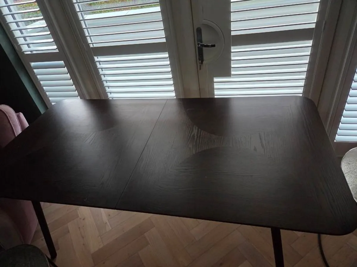 Absolutely stunning designer extendable ( from 6 to 8 /10 chairs)dark oak dining table for sale! A must see!! - Image 3