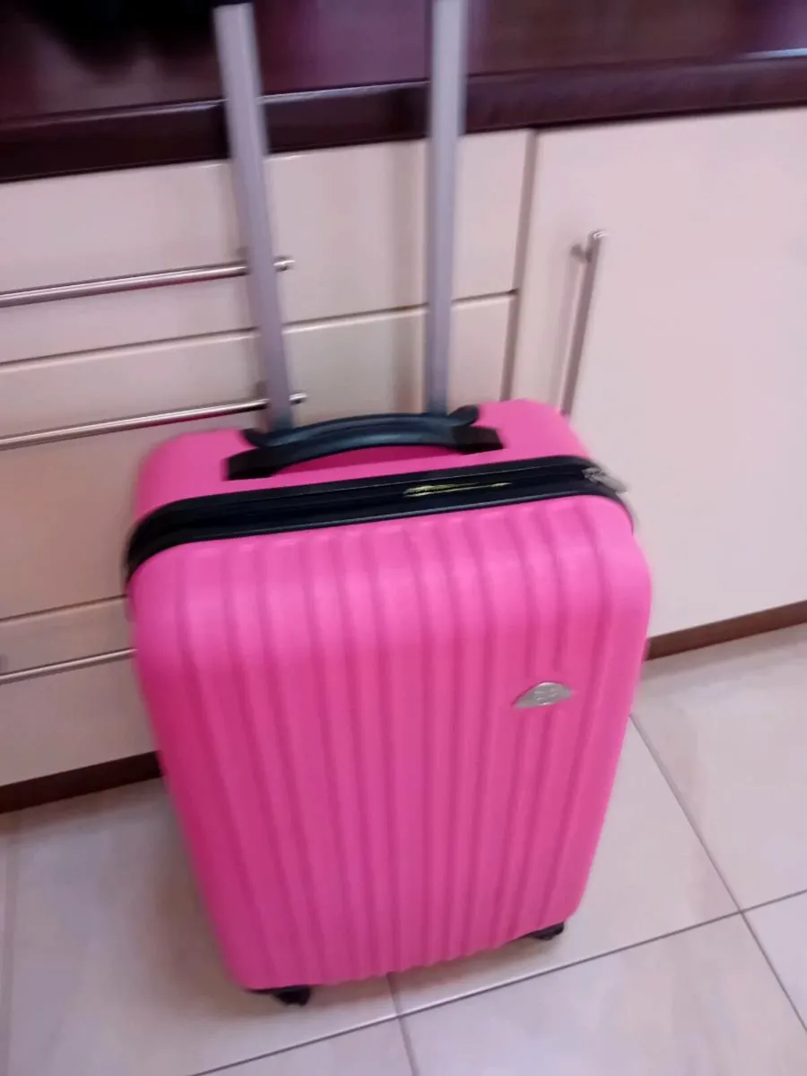 LARGE PINK SUITCASE 4 WHEELS - Image 1