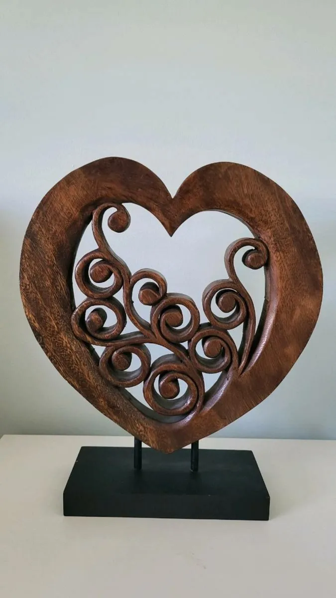 Large wooden carved heart sculpture
