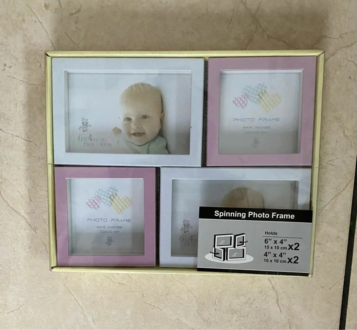 NEW SEALED Spinning Photo Frame - 4 pictures - Image 1