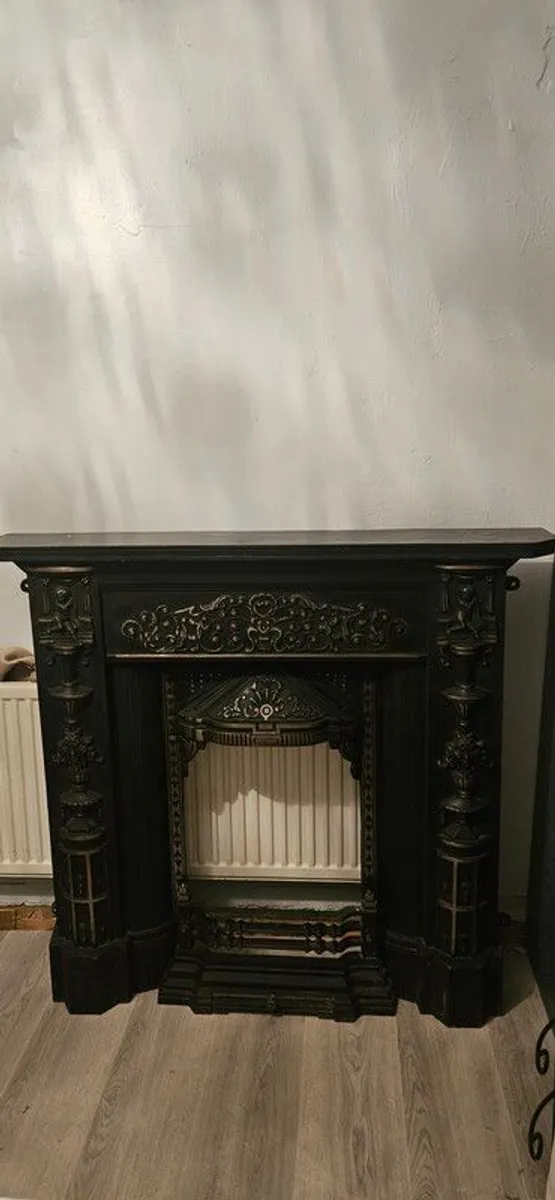 cast iron fire surround 43inches height 45 inches width - Image 1