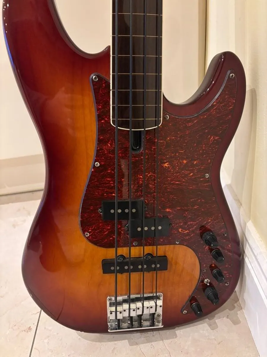 2 basses, 1 fretless & 1 upright electric for one price - Image 2