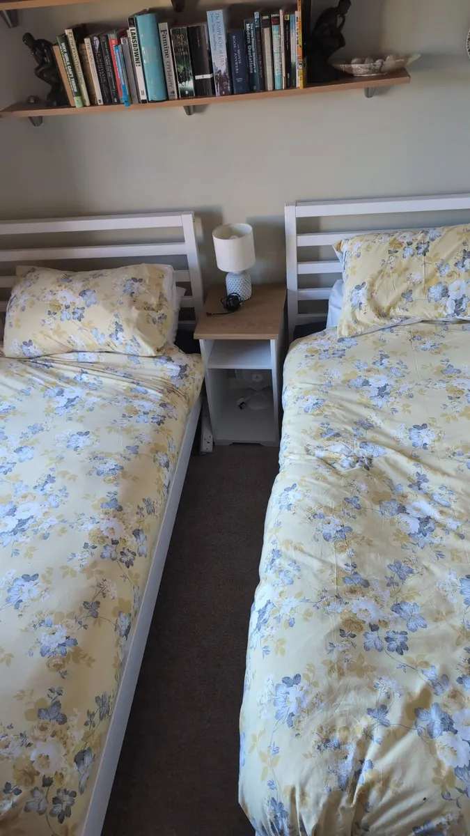 2 x IKEA single beds with mattresses and duvet set - Image 1