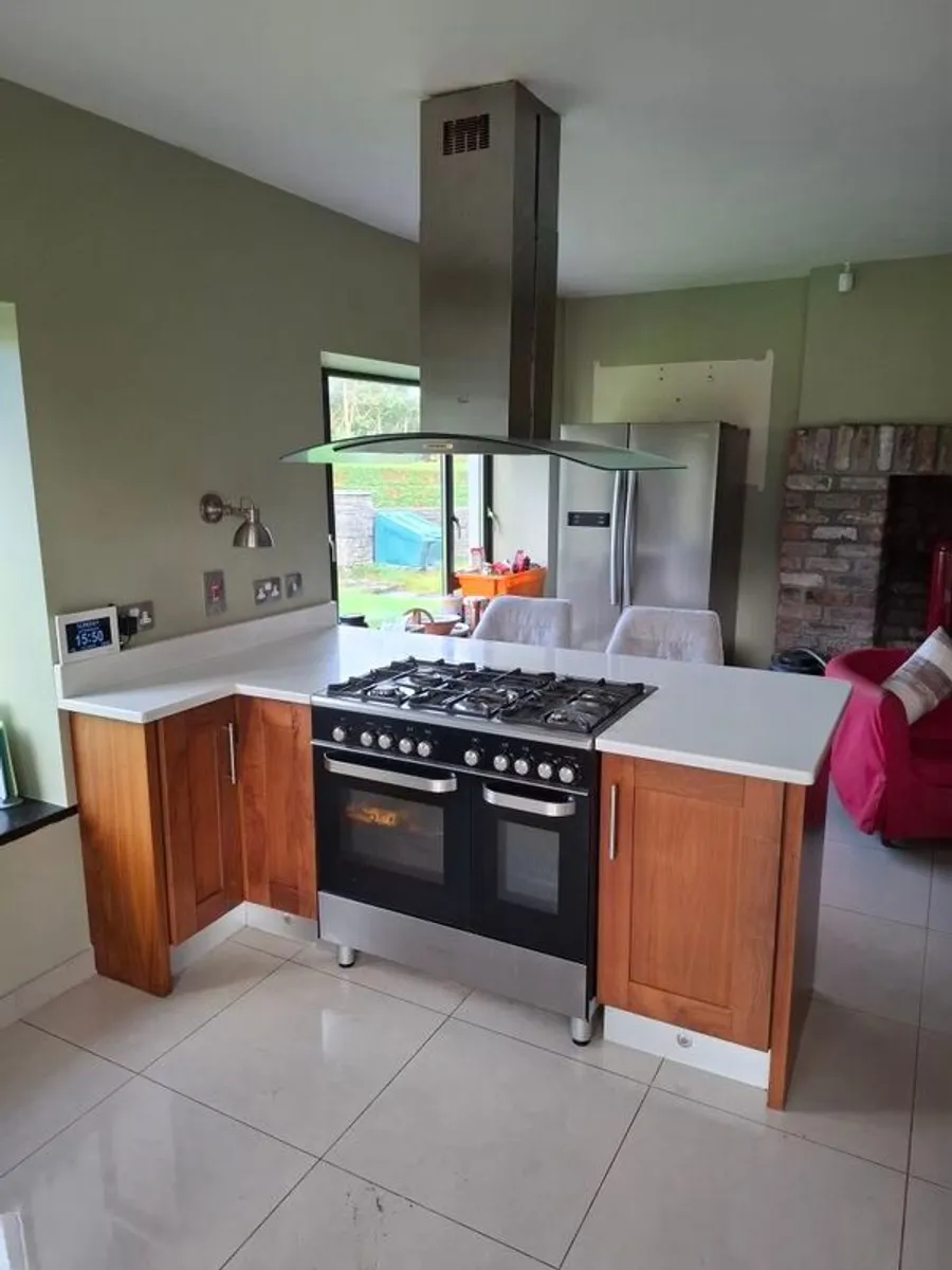 Walnut Kitchen with Corian Countertops - Image 1