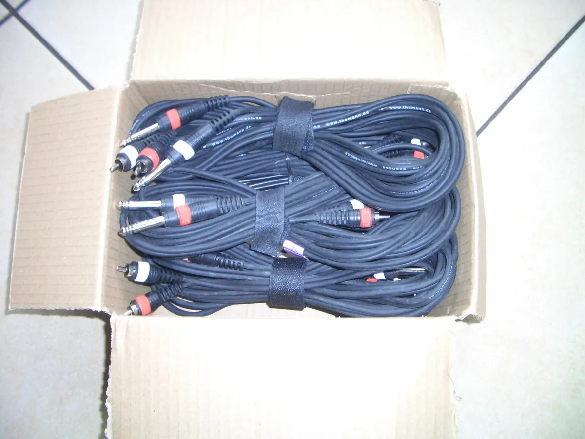 BOX OF AUDIO CABLES- 1/4 JACK TO RCA - Image 1