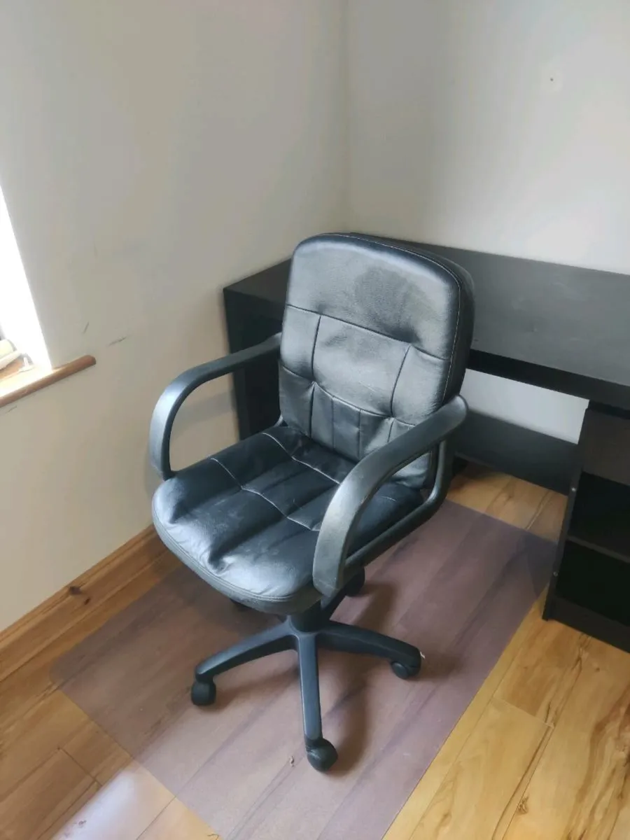 Black faux leather office chair