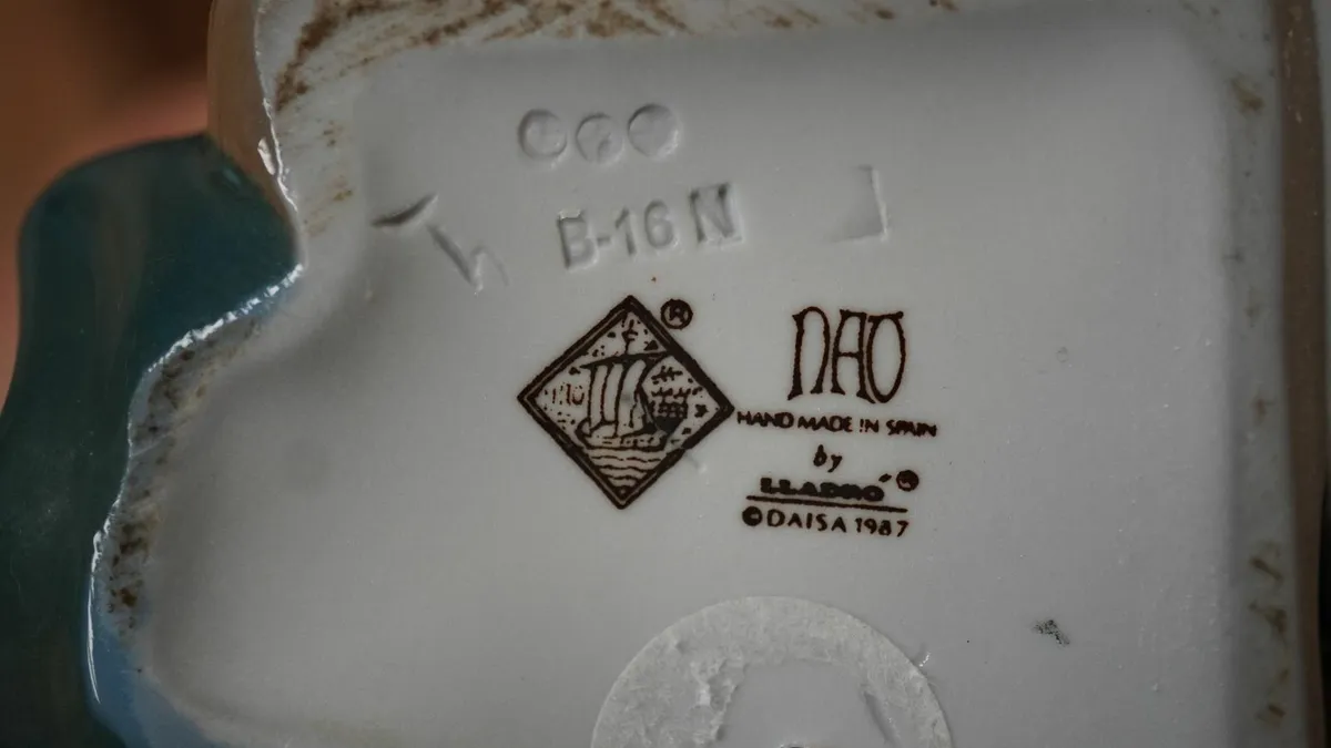 Nao by Lladró “Tying His Shoe” Porcelain Figurine - Image 4