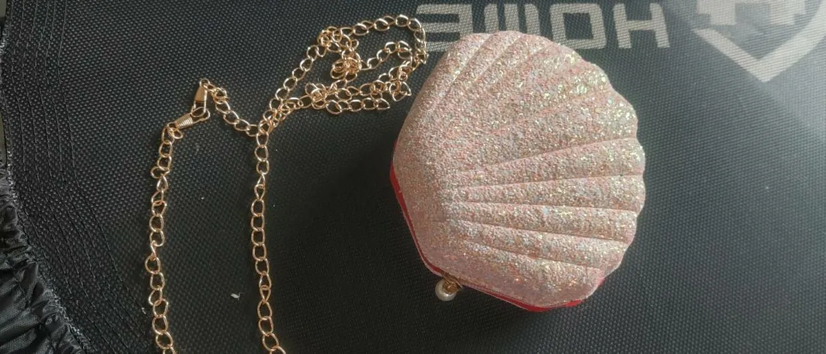Pink glitter clutch bag shell style - Image 1