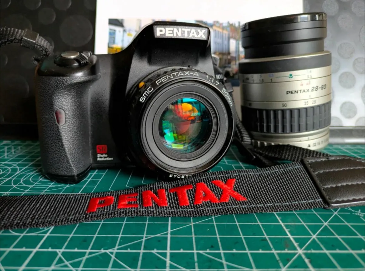 Pentax K100D Super + 2 lenses 50/1.7 A and Zoom AF - Image 1
