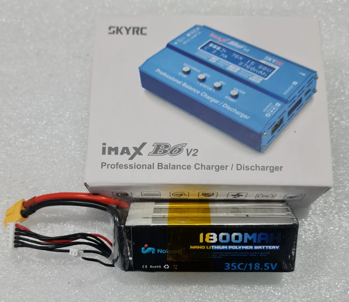 Battery and Charger - Image 1