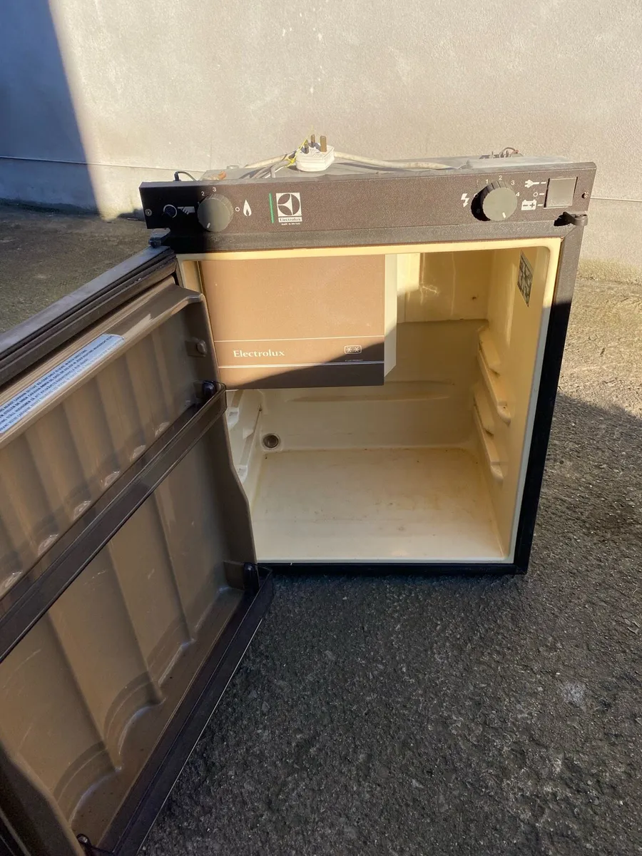 Three way fridge and also a sofa bed - Image 2