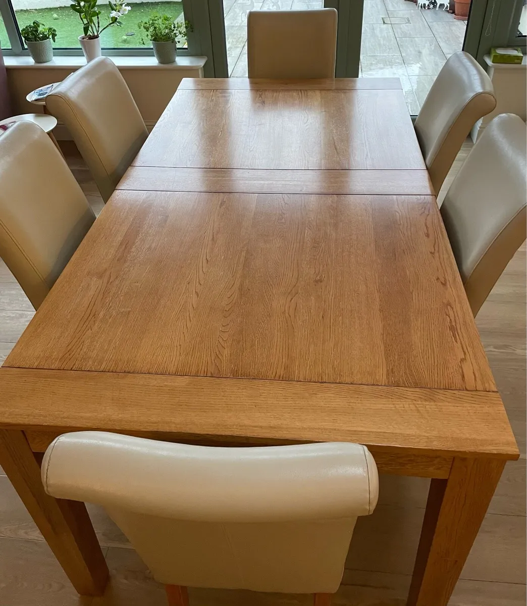 Solid oak table and six chairs - Image 1
