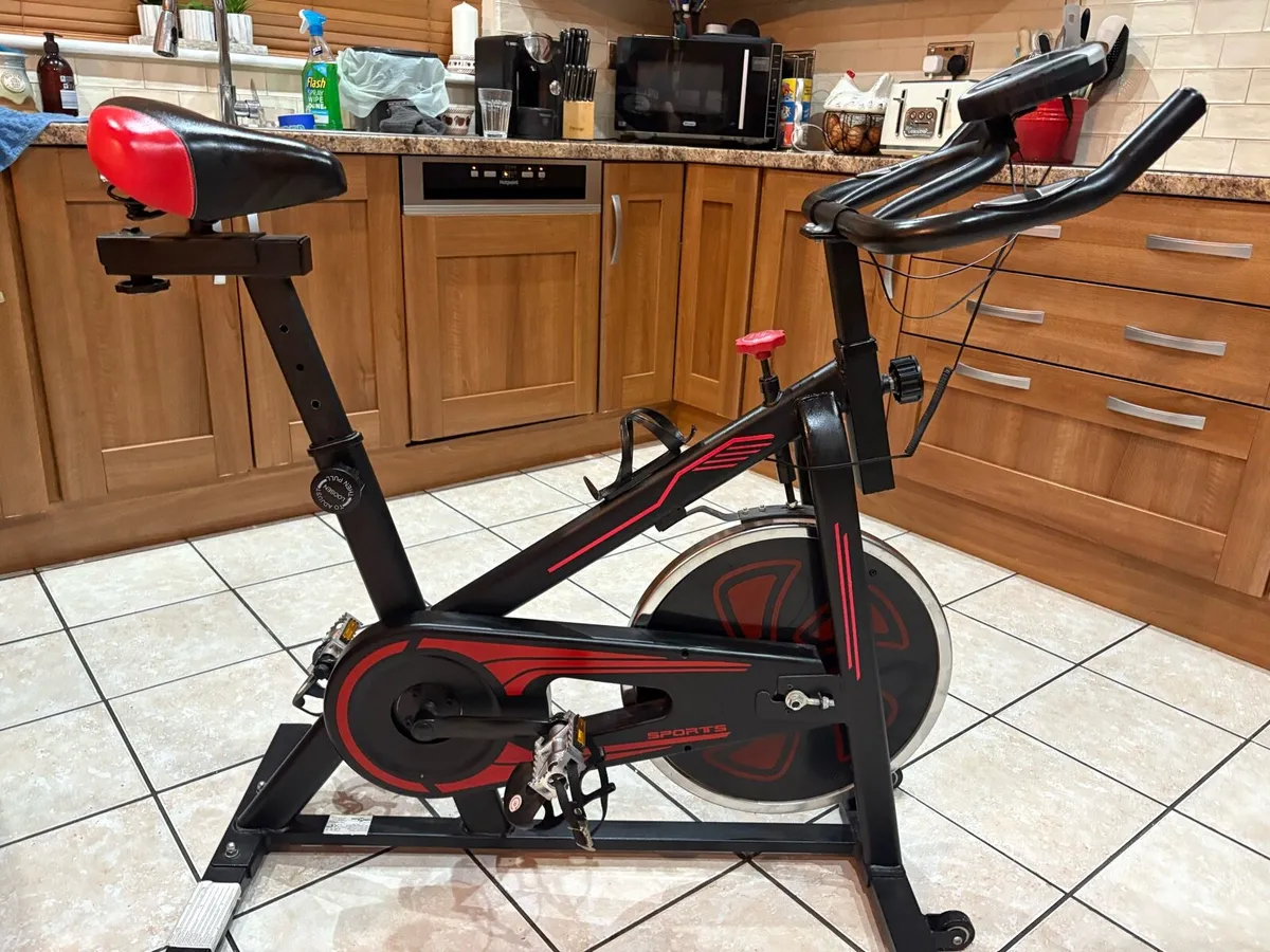 SPIN BIKE, ADJUSTABLE SADDLE, HANDLEBARS ETC. - Image 1