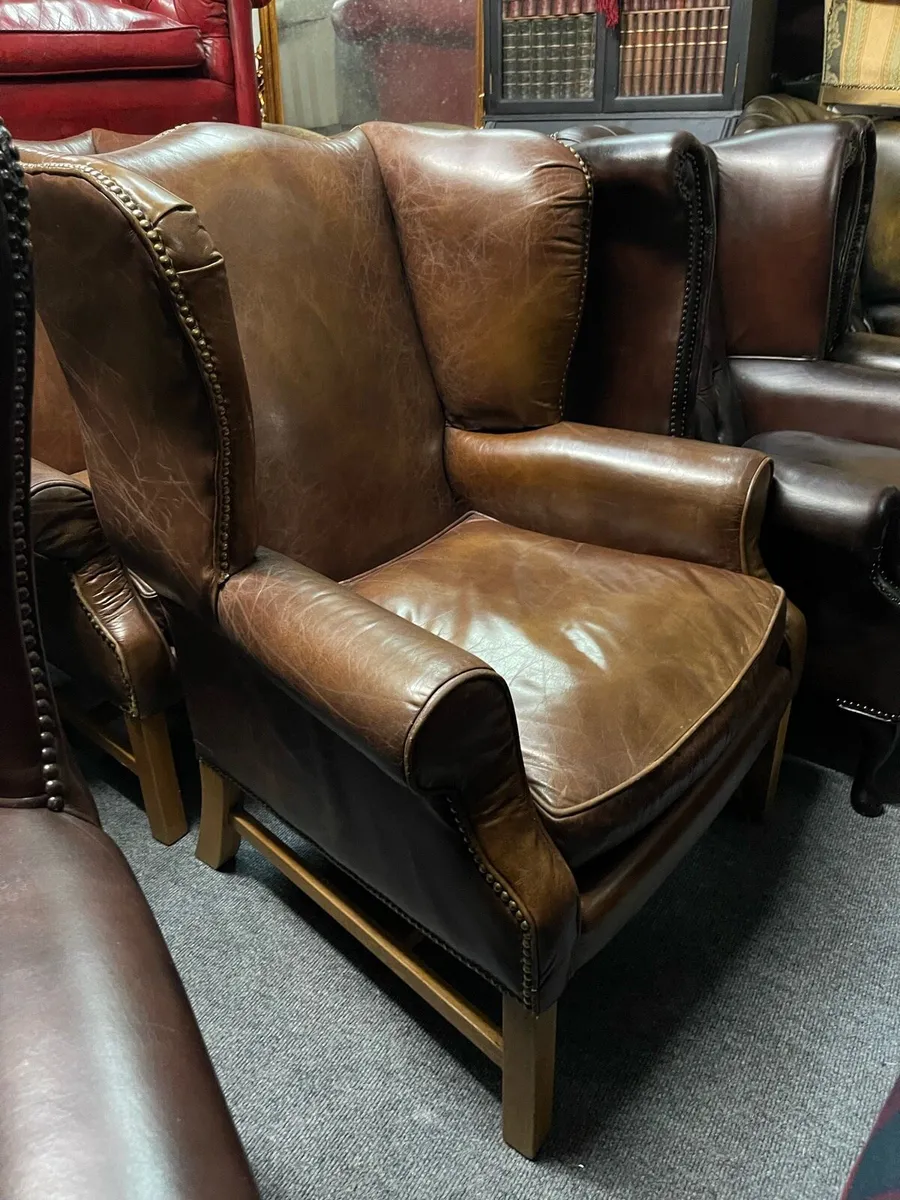 Matching pair halo leather chairs - Image 1