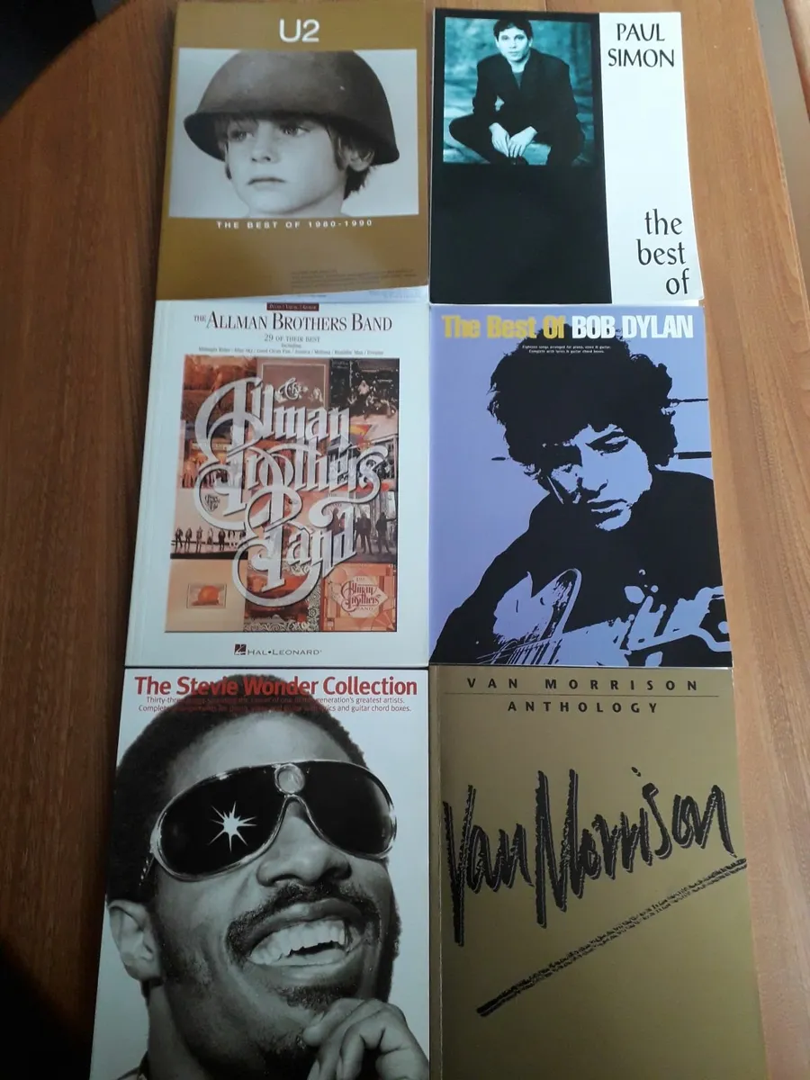 12 Song books Bob Dylan Allmans Eagles Paul Simon - Image 1