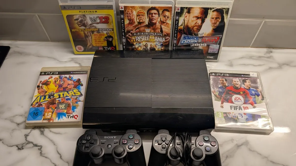 Playstation 3 with selection of games. - Image 1
