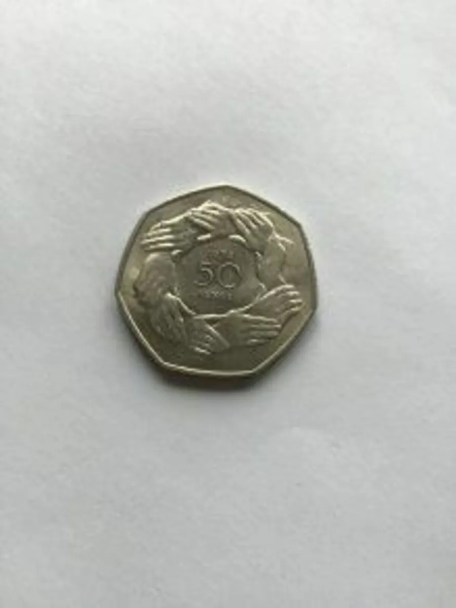 1973 English Circle of Hands 50 pence coin
