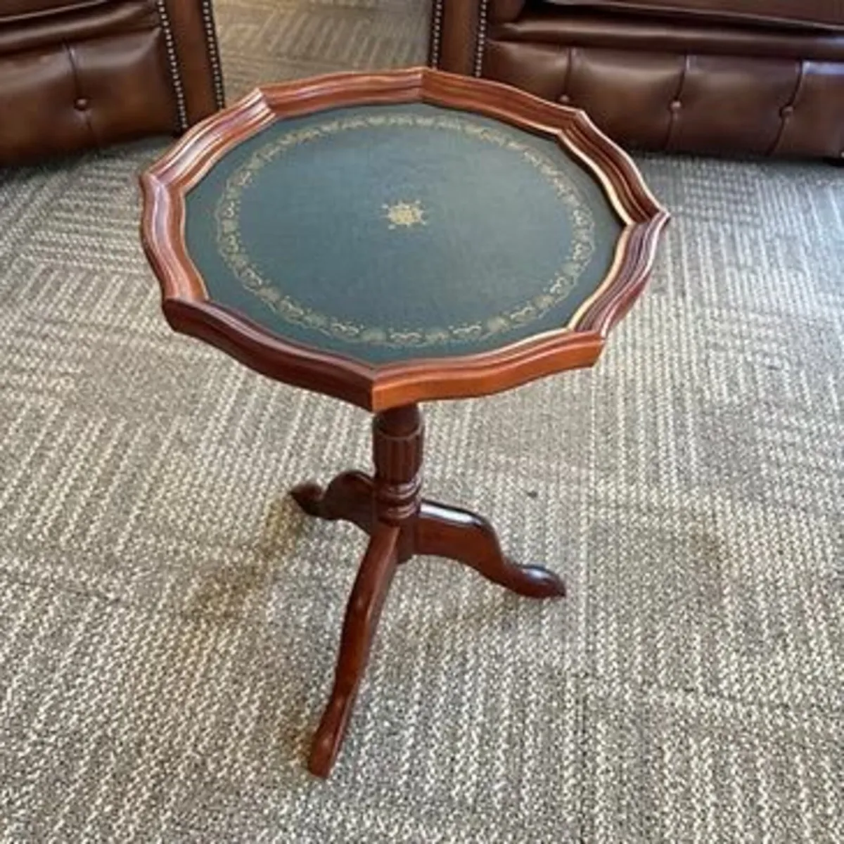 Mahogany rippled edge teal green leather top wine