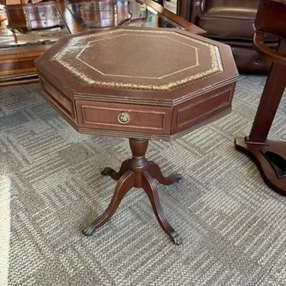 Octagonal occasional table on tripod base with two
