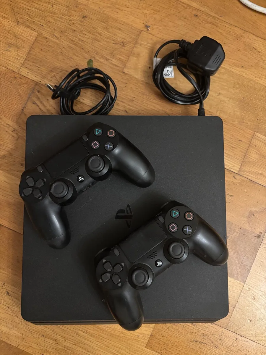 PlayStation 4 slim with 2 controllers