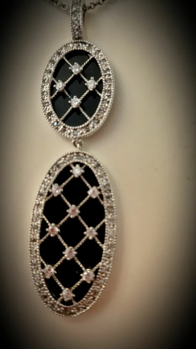 Silver and Black Pendant and Bracelet - Image 3