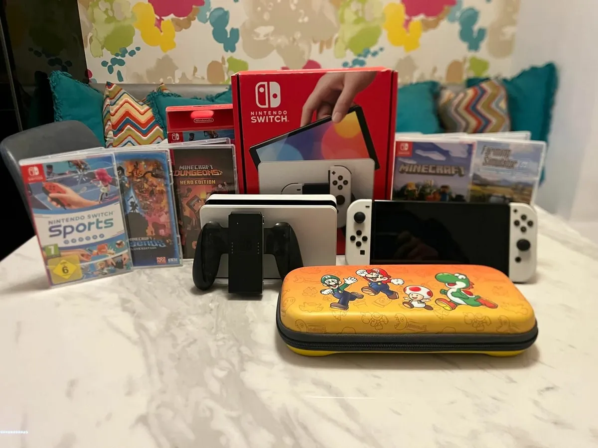 Nintendo Switch + Games - Image 1