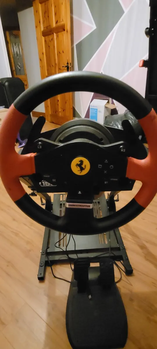 Thrustmaster T150 Ferrari steering wheel and stand - Image 1