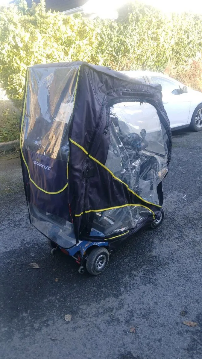 Rascal electric scooter with waterproof cover - Image 2