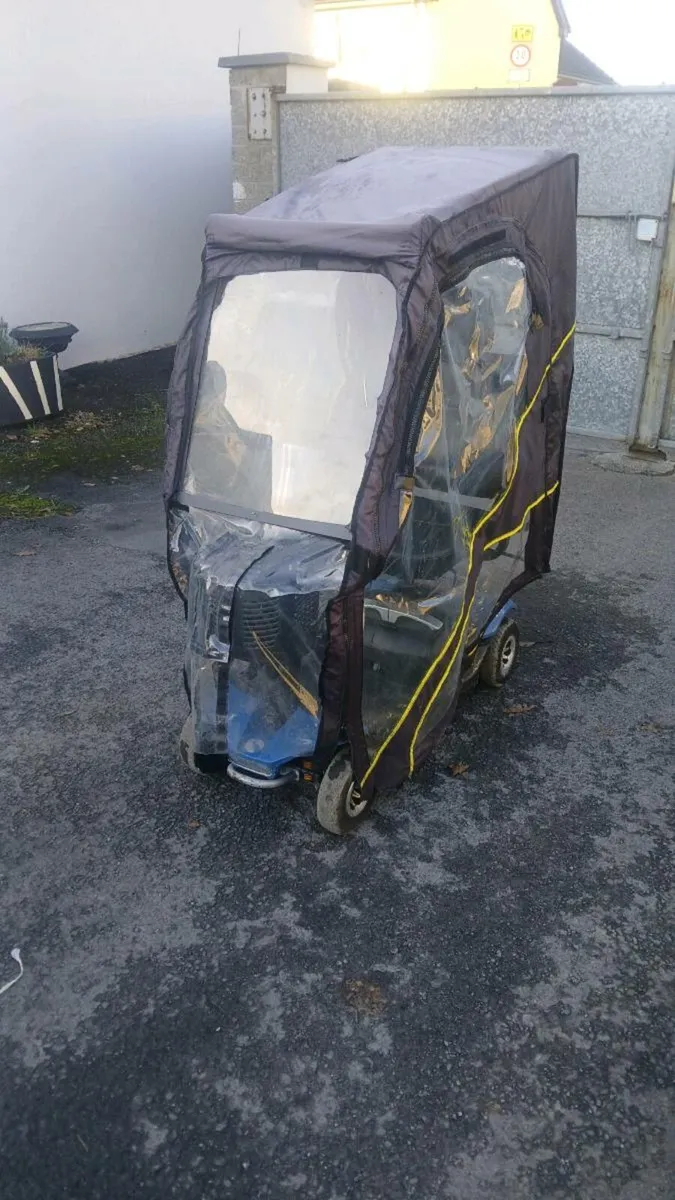 Rascal electric scooter with waterproof cover - Image 3