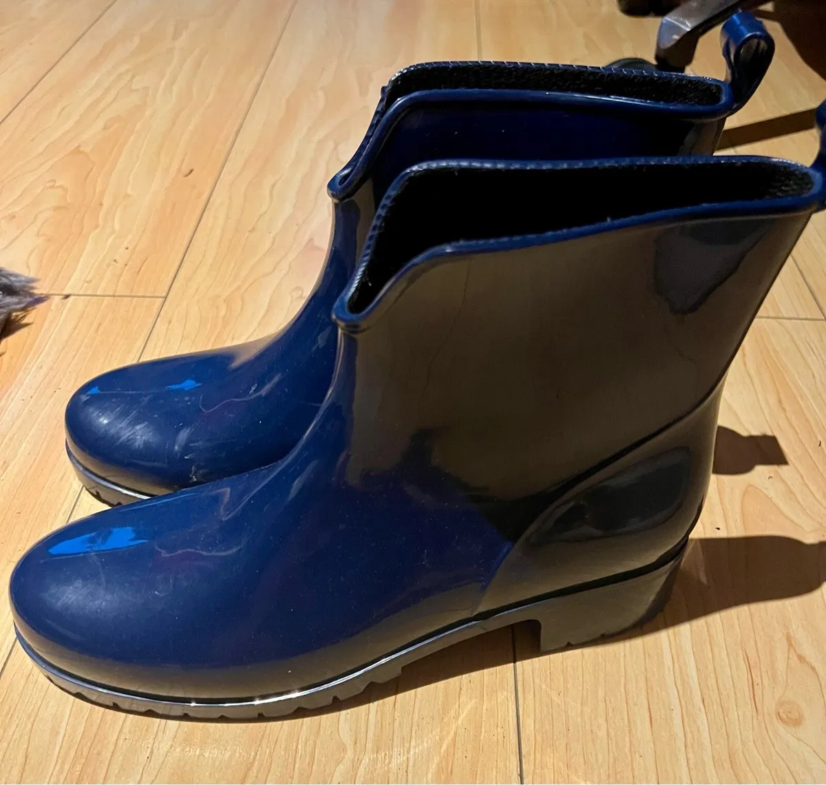 rain boots. - Image 1