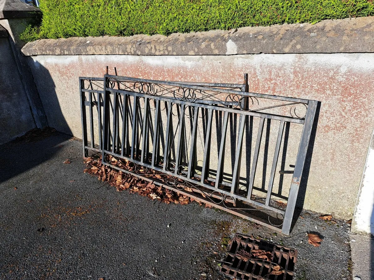 Iron Gates and a Rocking Chair - Image 1
