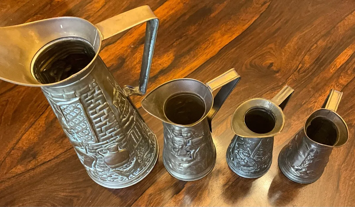 Set of 4 Antique Brass Embossed Pitchers - Image 3