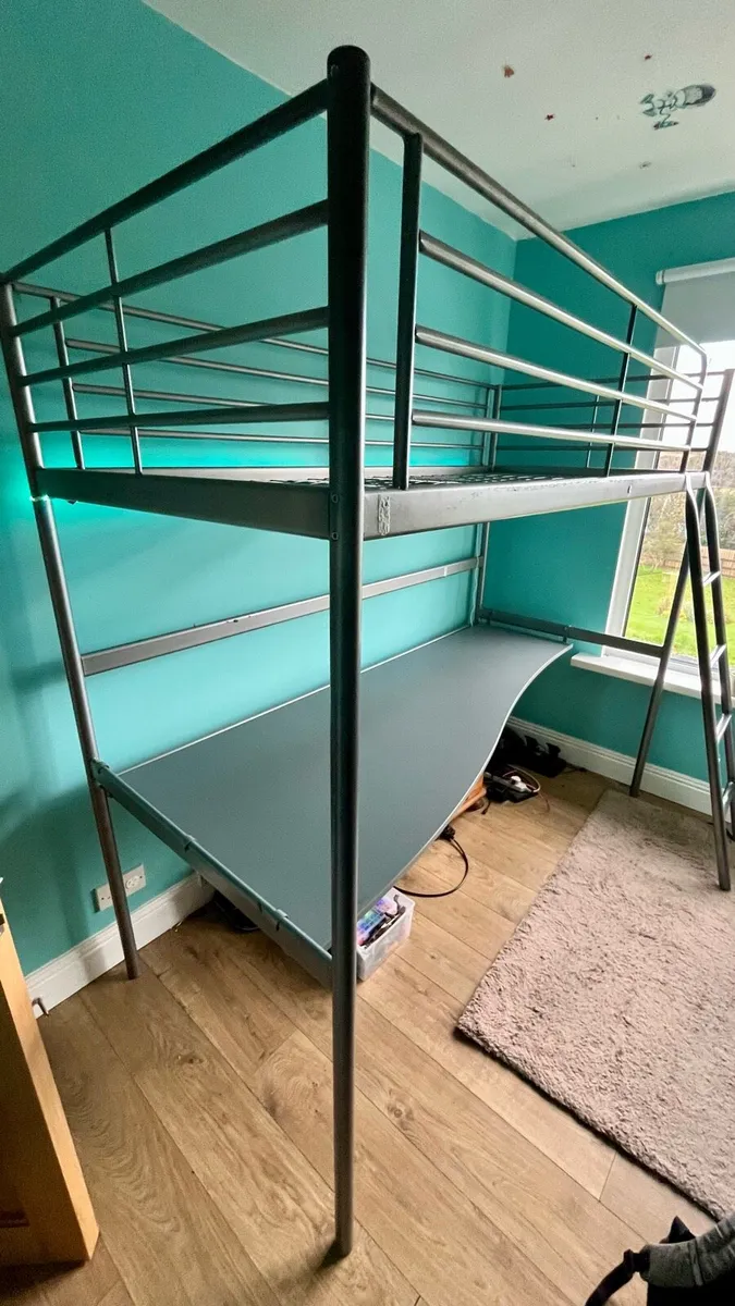 High rise bed with a large table - Image 1