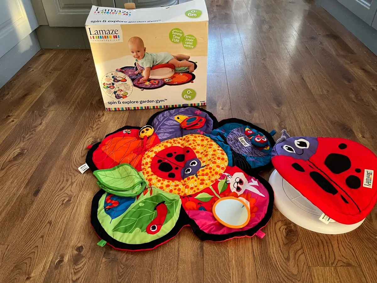 Tummy time spin and explore garden gym