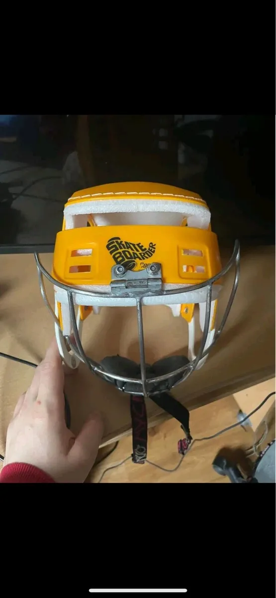 Yellow Skateboarder Hurling Helmet