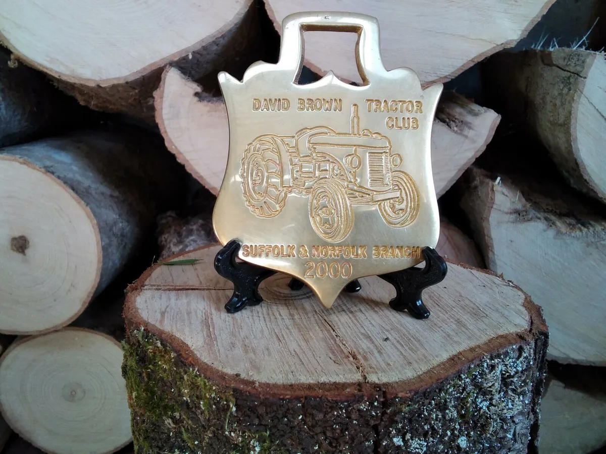 Cropmaster badge and model tractors. - Image 1